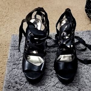 Black high heels with wrap around lace